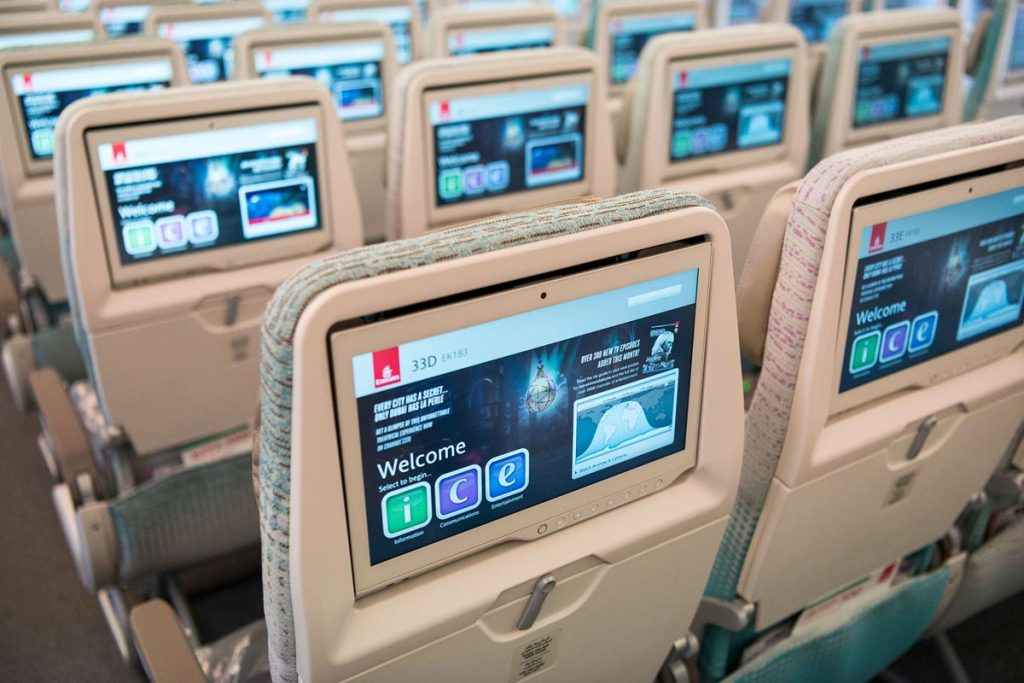 Comparison of Emirates standard cabin service versus specialised Hajj amenities and features