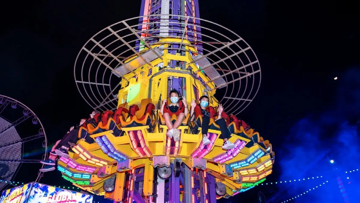 Global Village rides and entertainment including Carnaval attractions and live Main Stage performances at night