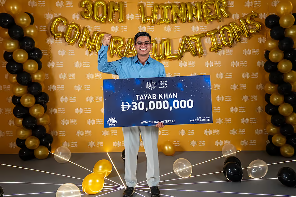 A 26-year-old Abu Dhabi security guard won the Dh30 million UAE Lottery Grand Prize with four friends who pooled tickets. Each takes home Dh6 million.
